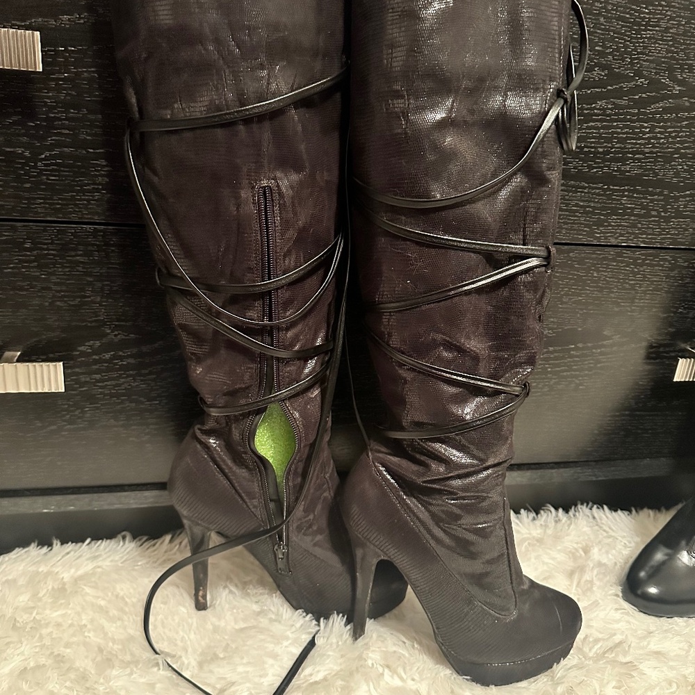 Knee high stiletto boots